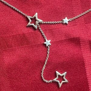 ORIGINAL Tiffany's silver star lariat. New in box.